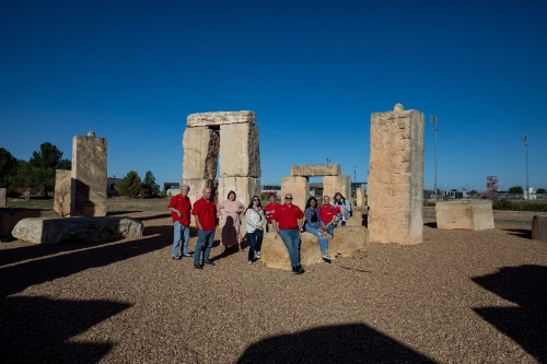 Members of the SunSketcher team near the Stonehenge replica at the University of Texas Permian Basin (UTPB) in Odessa, TX (Clinton Lewis/WKU)