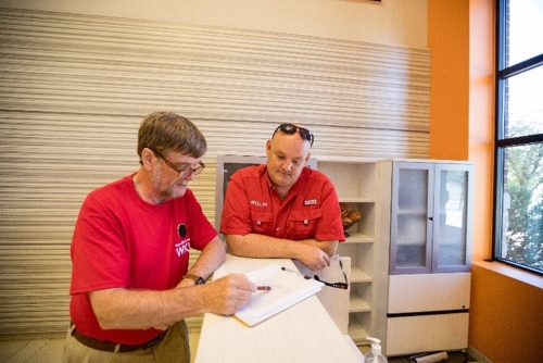 SunSketcher PI Gordon Emslie (left) of the WKU Department of Physics & Astronomy discusses eclipse measurements with Professor Greg Arbuckle of the WKU School of Engineering and Applied Sciences (Clinton Lewis/WKU)