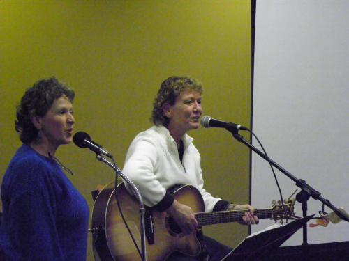 Susan and Molly singing the History of Us, a song composed by Molly for the 20th Anniversary of the WKU Women's Studies Program