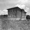 In 1926, the county built a new Oakland School. The two-story structure had five classrooms, a library, auditorium, principal's office, lunch room and a basement. By 1932-33, Oakland offered four years of high school work. (Courtesy of Library Special Collections, WKU)