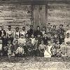 View Bridgeport School's log house was built ca. 1890 with students still being schooled in the facility in 1924. The school's teacher, Emery White (far left), later served as Warren County Superintendent of Schools. (Courtesy of Library Special Collections, WKU) Larger