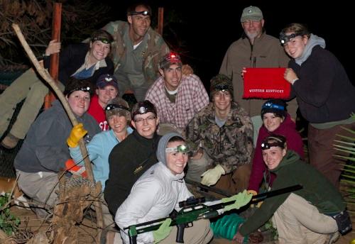 Students participating in the African wildlife management class pose with an 800-pound crocodile after removing it from a live trap in order to move it from a farm where it was causing trouble. Pictured are (front row, left to right) graduate student Kelly Derham, junior Rachel Beyke; (second row, left to right) Cheryl Kirby-Stokes, graduate student Merrie Richardson; (third row, left to right) spring 2012 graduate Alison Emmert, senior John Clark; (fourth row, left to right) graduate student Cynthia Worcester, senior Nikki Roof, junior Adam Edge; and (fifth row, left to right) senior Sara Wigginton, game capture specialist Andre Pienaar, Dr. Michael Stokes and junior Lydia Hall.