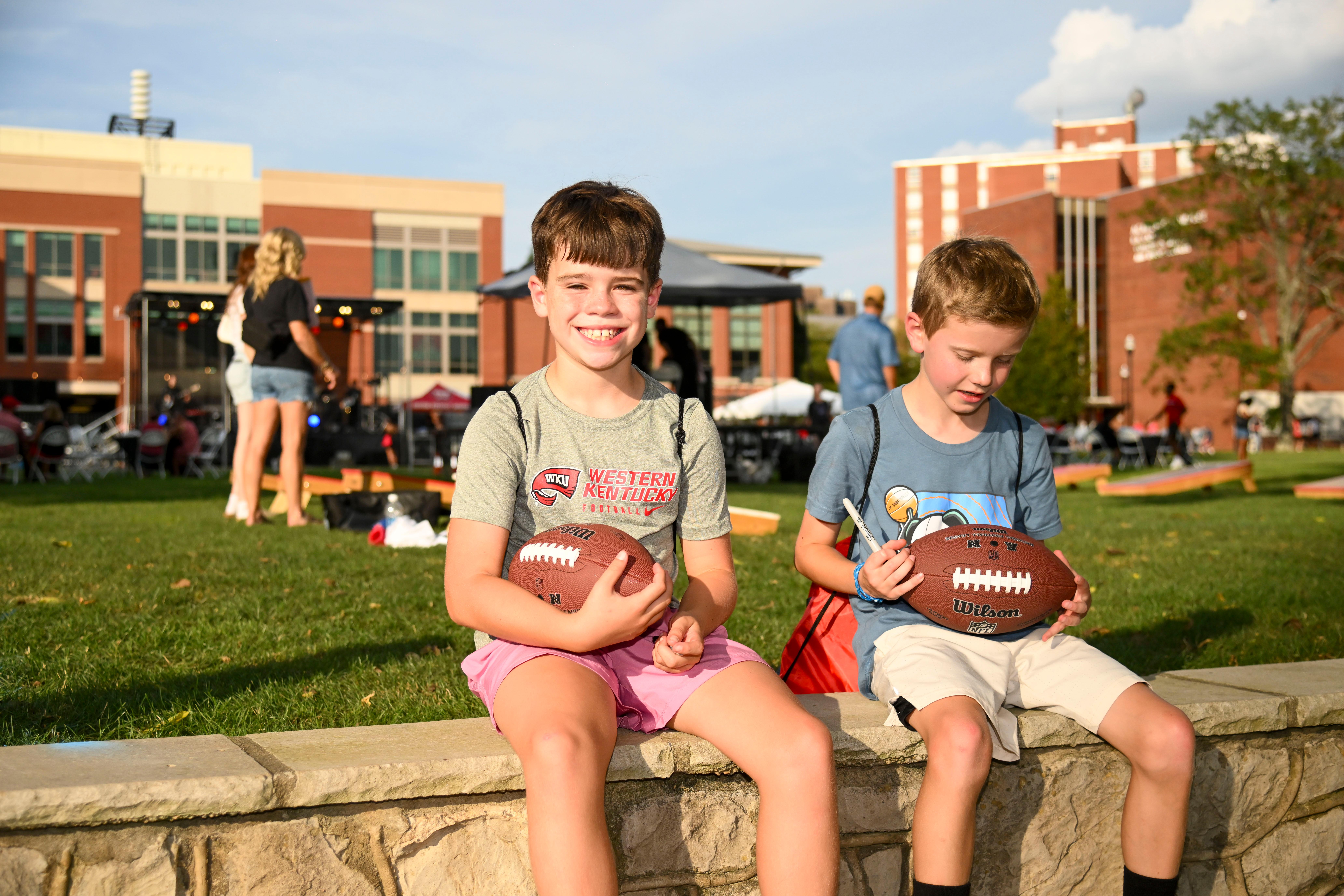 Children posing for a group photo at Topper Fest