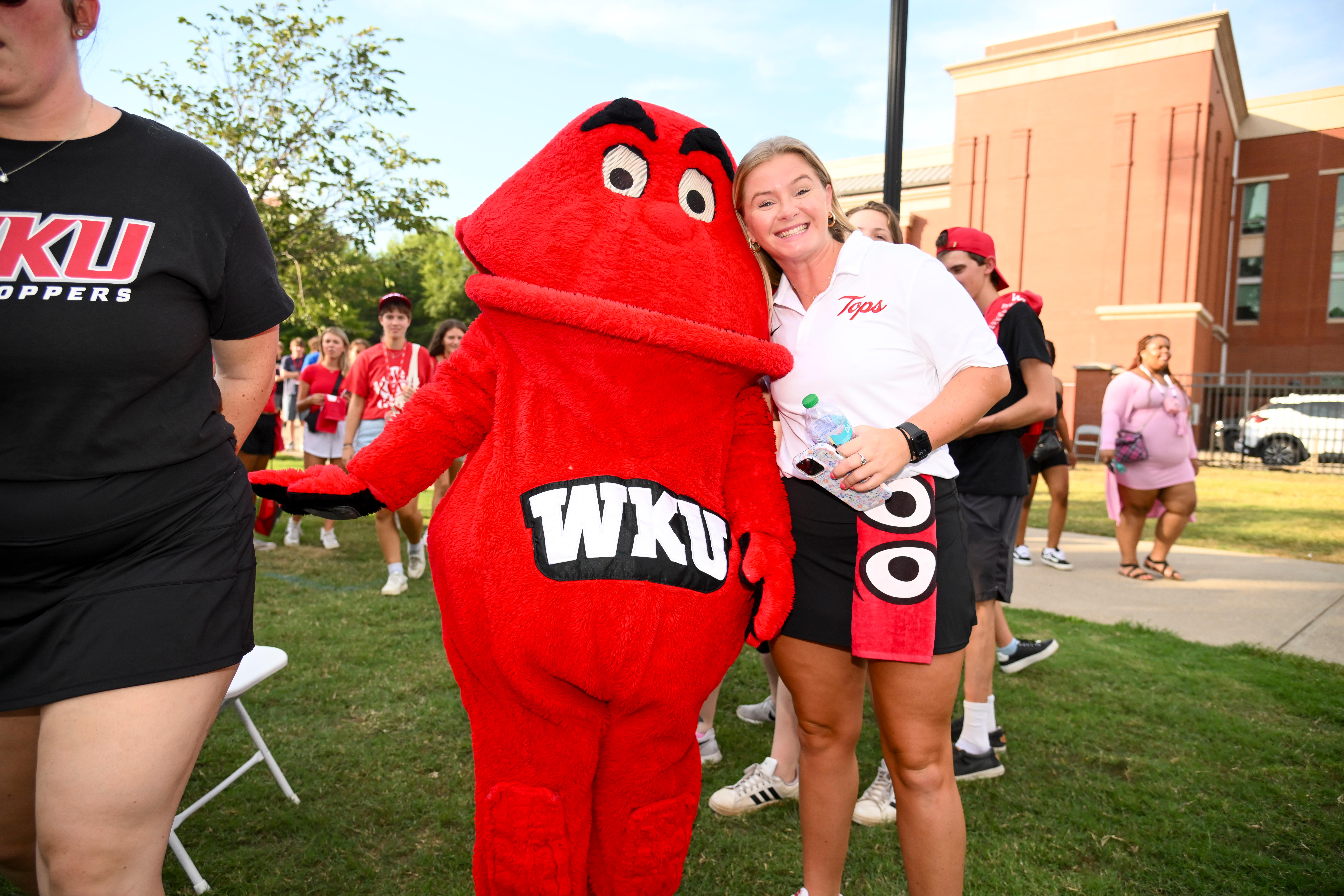 WKU student-athletes posing for a group photo at Topper Fest