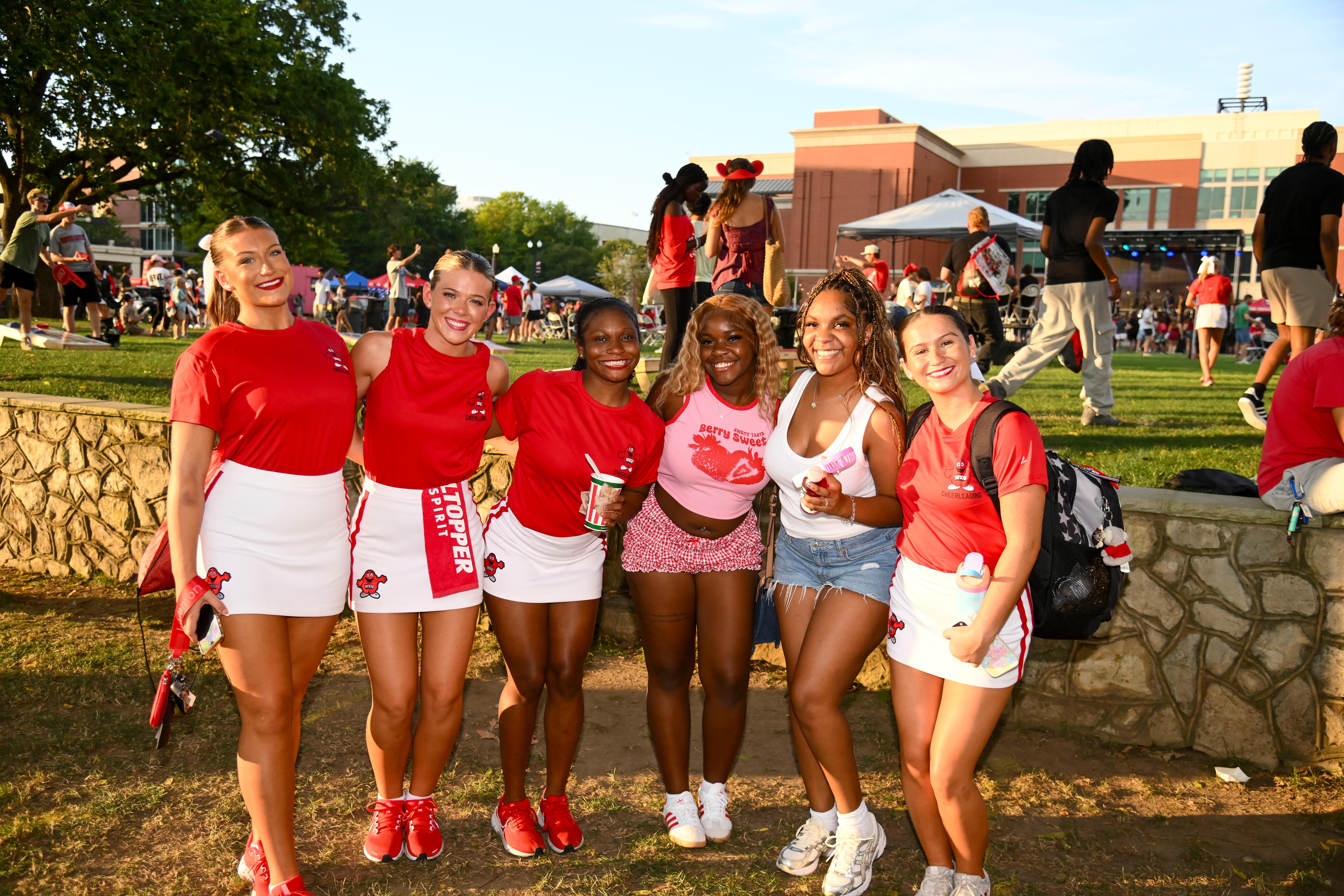 Friends posing for a group photo at Topper Fest