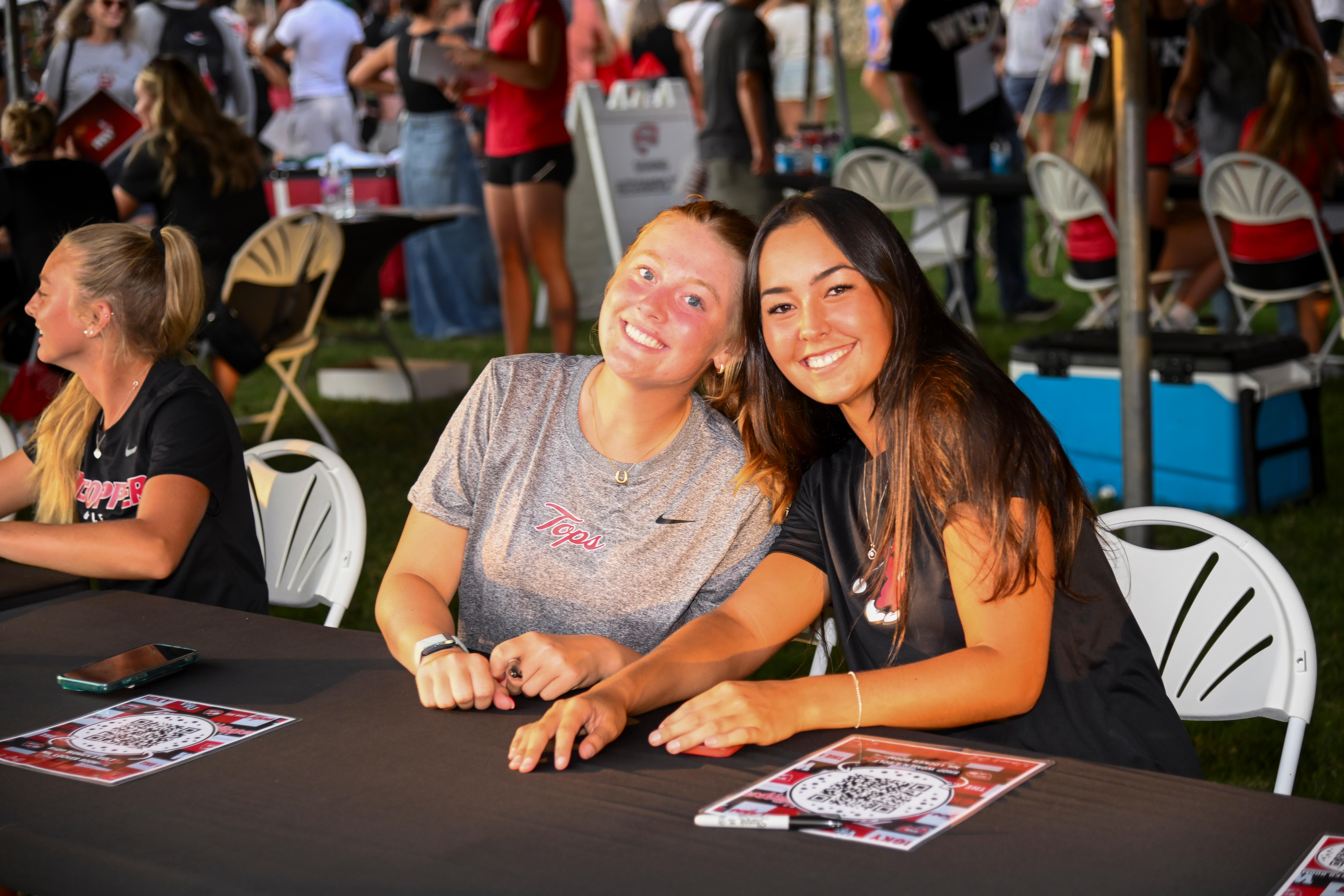 WKU student-athletes posing for a group photo at Topper Fest