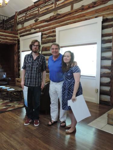 Dale Rigby presents Creative Writing winners Graduate student Clinton Craig and Undergraduate student Rachel Sudbeck