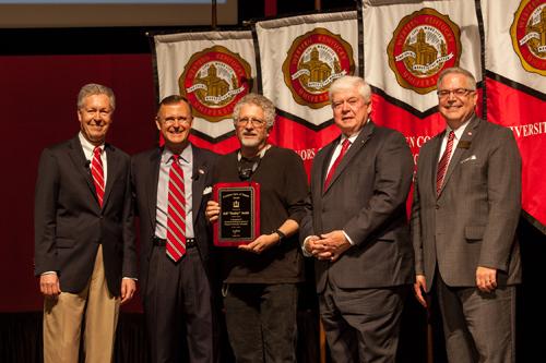 Jeff “Smitty” Smith (center) received the Spirit of Western Award. Participating in the presentation (from left) were: Provost David Lee, President Gary Ransdell, Regents Chair Freddie Higdon and Marc Archambault, Vice President for Development and Alumni Relations. (WKU photo by Clinton Lewis)