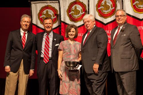 Laura Houchens (center) received the University Part-Time Faculty Award. Participating in the presentation (from left) were: Provost David Lee, President Gary Ransdell, Regents Chair Freddie Higdon and Marc Archambault, Vice President for Development and Alumni Relations. (WKU photo by Clinton Lewis)