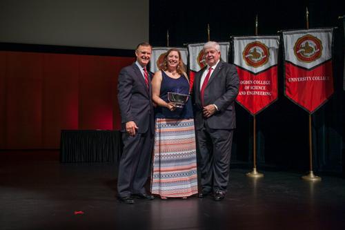 Dr. Audrey Anton (center) received the University Award for Teaching. Participating in the presentation were President Gary Ransdell and Regents Chair Freddie Higdon. (WKU photo by Bryan Lemon)