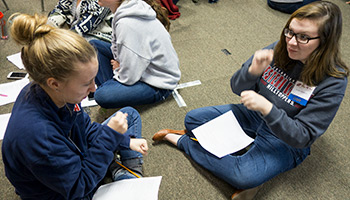 Participants doing group work during a workshop