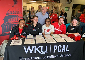 Student group at a booth.