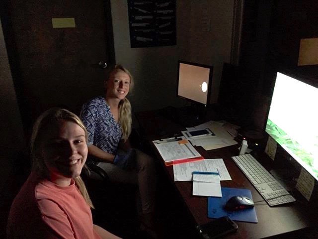 Dixi Secula and Allison Rinne working on data