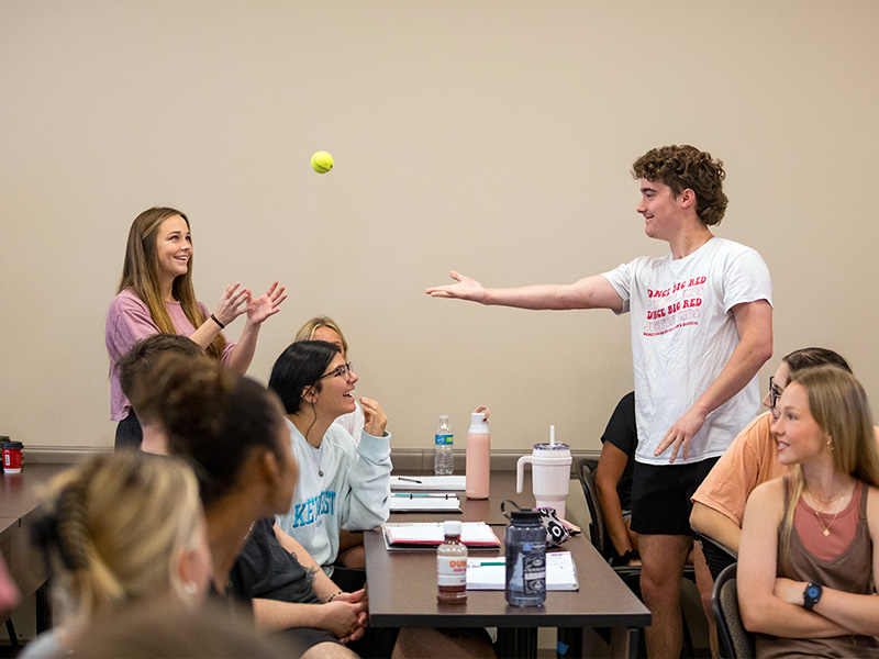 WKU Psychology students participating in an interactive classroom demonstration with a tennis ball in Dr. Steven Wininger's class. WKU Psychology students participating in an interactive classroom demonstration with a tennis ball in Dr. Steven Wininger's class.
