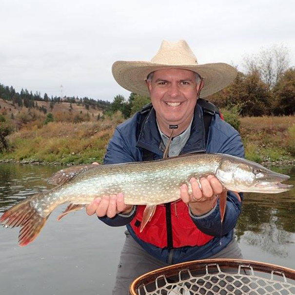 Dr. Poff with a pike caught in Montana