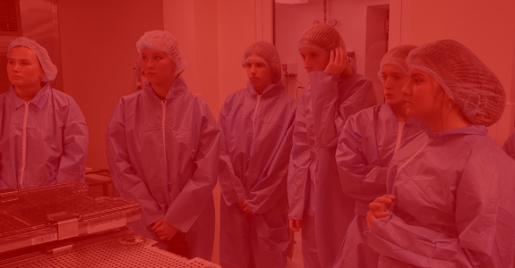 students dressed in scrubs