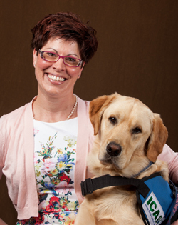 Photo of Dr. Darbi Haynes Lawrence and her dog.