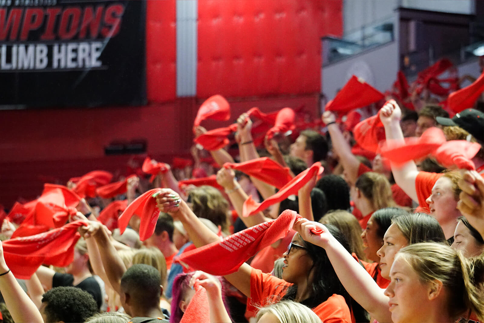 WKU students and fans waving red towels