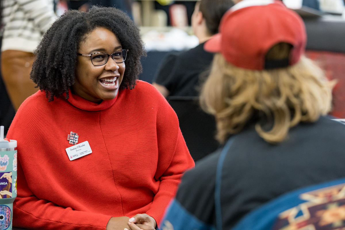 A WKU employee speaks to a student.