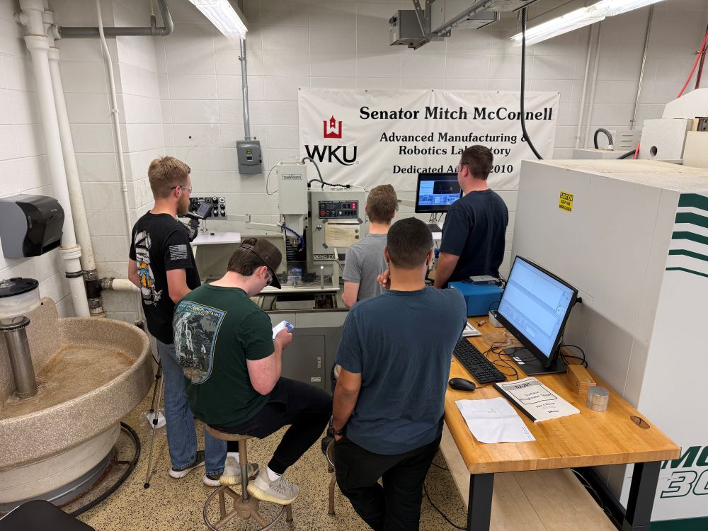 Student researchers collaborating on laboratory initiatives